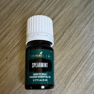 Young Living Spearmint Essential Oil in Teal and White